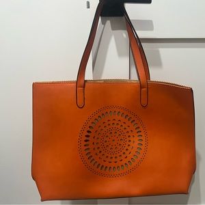 Neiman Marcus orange leather tote bag. Perfect condition. Never used